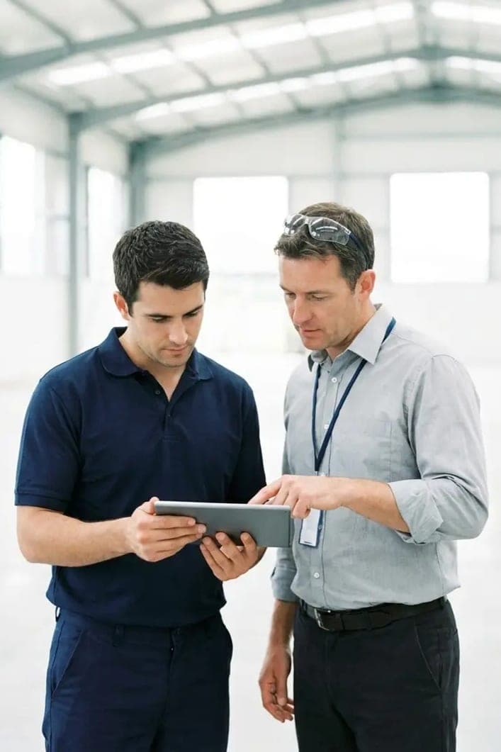 Two colleagues talking through a safety concern where the work happens
